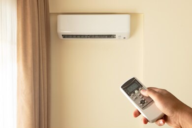 man feels extremely hot right after arriving home.