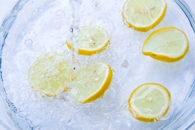 yellow lemon in water,studio shoot