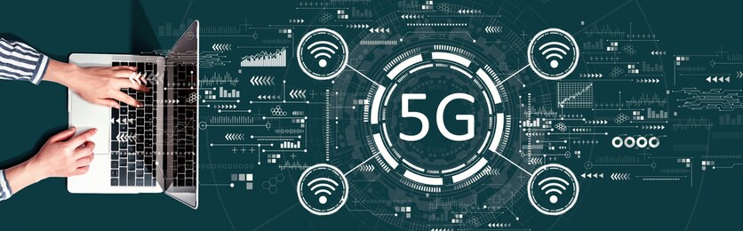 5g network with person using a laptop computer