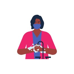a woman is wearing a mask and washing her hands