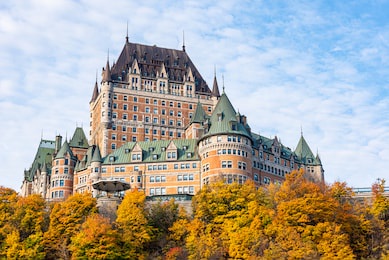 the frontenac castle (fairmount hotel) in the old quebec city (canada) with autumn colors.