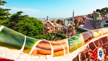 barcelona, spain - july 19: ceramic mosaic park guell on july 19, 2013 in barcelona, spain. park guell is the famous architectural town art designed by antoni gaudi and built in the years 1900 to 1914
