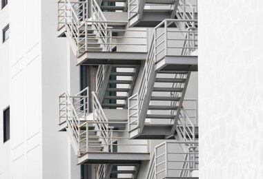 fire escape stair steel. grey outdoor metal stair of building.