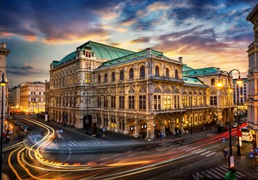 vienna state opera. veinna, austria. evening view. the historic opera house is a symbol and landmark of the city of vienna.  panoramic view, long exposure. 