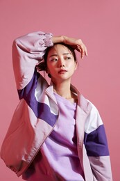 young asian woman with glitter make-up wearing sporty fashion