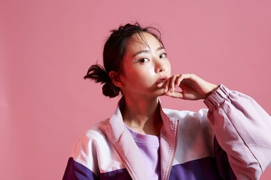 young asian woman with glitter make-up wearing sporty fashion