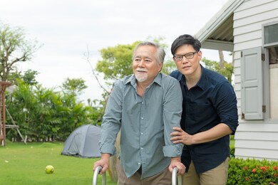 the son helped support the father was hurt in his legs,  was inconvenient to walk. needed to use equipment to walk. the concept of love and care.