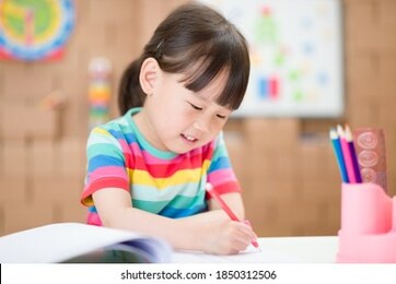 young girl practice drawing different shapes  for homeschooling