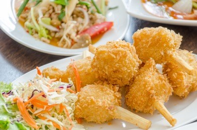 fried shrimp ball on sugarcane skewers, vietnamese food.