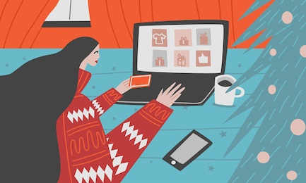 christmas online shopping on laptop. woman is holding credit card and make christmas shopping and order some christmas presents. 
