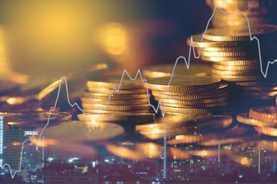 double exposure of finance graph , stationary and rows of coins for goal office , finance and business concept background and forex trading graph with economy trends business or finance background.