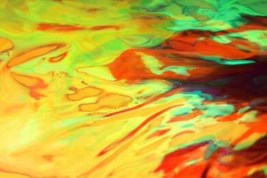 holographic abstract background, bright iridescent neon colors, beautiful 90s style wallpaper, blurred, glowing festive gradient. the texture of liquid metal, multi-colored foil. place for text.