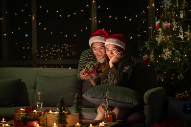 young asian couple celebration christmas night party and happy new year 2021