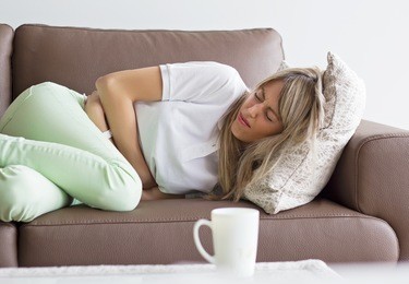 woman having stomach pain