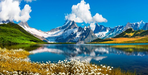 sunrise view on bernese range above bachalpsee lake. peaks eiger, jungfrau, faulhorn in famous location in switzerland alps, grindelwald valley