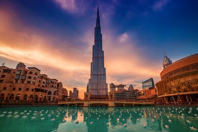 burj khalifa in dubai, uae. the tallest skyscraper building in the world, travel attraction with blue pool on foreground