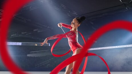 rhythmic gymnast in professional arena.