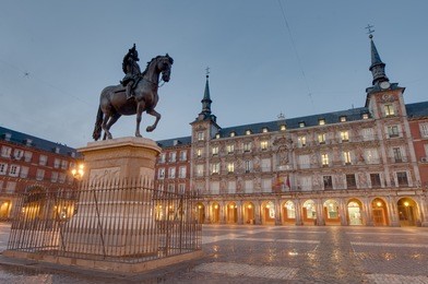 bronze statue of king philip iii at the center of the square, created in 1616 by jean boulogne and pietro tacca on the plaza mayor in madrid, spain.