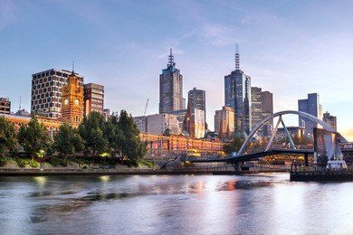 melbourne, australia, in early morning light.  yarra river, towards flinders street station.