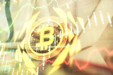 double exposure of woman hands typing on computer and crypto market theme hologram drawing. blockchain concept.