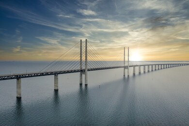 the bridge between denmark and sweden, oresundsbron. aerial view of the bridge during cloudy stormy weather.