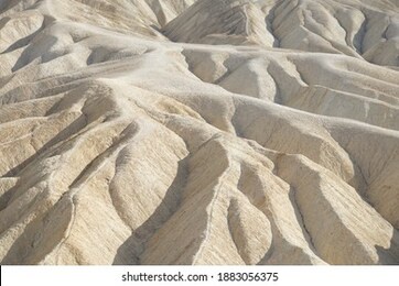 close-up view of the textures and patterns in the landscape at zabriskie point in death valley national park