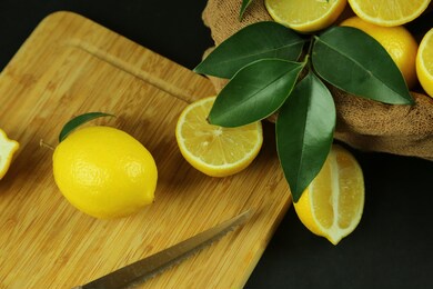 group of lemons with leaves, isolated on background