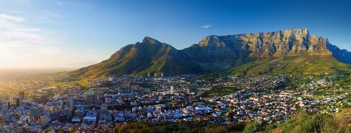 panoramic view of the city in dawn (sunrise in cape town, table mountain views)