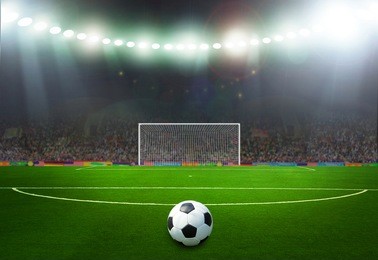 soccer ball on the field of stadium with light 