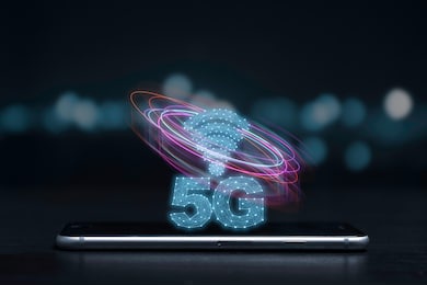 5g and internet of things or iot concept, 5g and internet sign with virtual effect on smartphone. iot is high technology which every device will connect and control by 5g high speed internet.