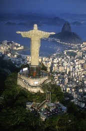 rio de janeiro, rj, brazil: aerial view of christ, symbol of rio de janeiro, standing on top of corcovado hill, overlooking guanabara bay