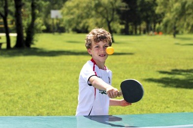 boy playing table tennis