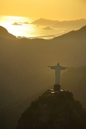 rio de janeiro, rj, brazil-december 6, 2012: aerial view of christ, symbol of rio de janeiro, standing on top of corcovado hill, overlooking guanabara bay