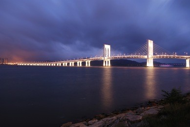 macau cityscape of bridge and skyscraper macao, asia.