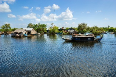 floating house and  houseboat on the tonle sap lake, between battambang and siem reap. cambodia.