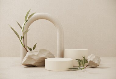 premium podium made of paper on pastel background with plant branches,leaves,pebbles and natural stones.mock up for the exhibitions,presentation of products, therapy, relaxation and health -3d render.