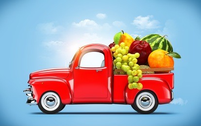 pickup truck loaded by fruits.