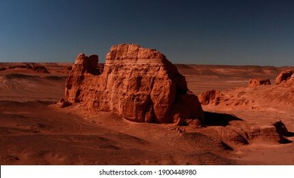martian landscape, flaming cliffs aerial view in the gobi desert. scorched earth where the remains of dinosaurs rest, and the layings of their eggs. mongolia. canyon herman-tsav.