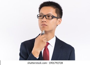 young man shaving his beard off with an electric shaver