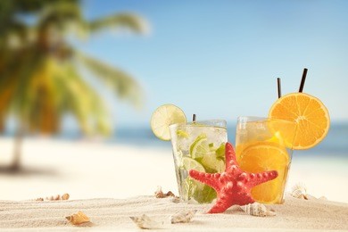 summer concept with exotic drinks, starfish and accessories.