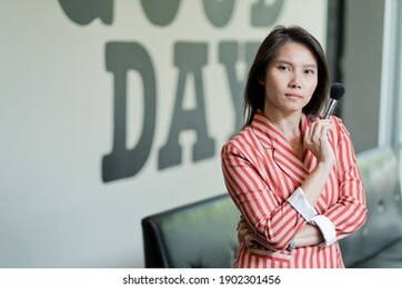 female makeup artist, professional, asian woman
