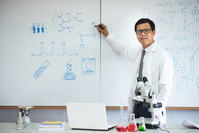 science teacher in front of the class.