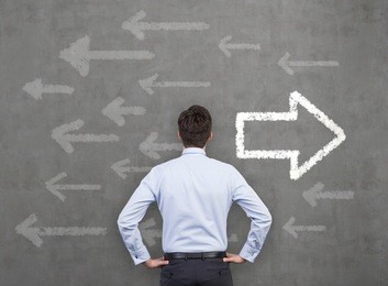 businessman and arrows 'left or right'. contradiction.