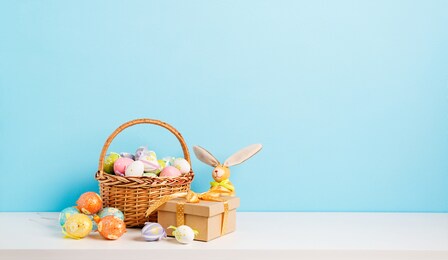 happy easter background. congratulatory easter background. easter colorful  eggs and gift.