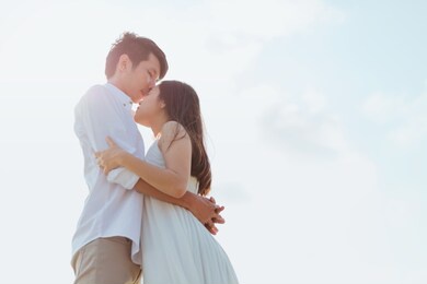 romantic time loving couple kissing on the beach. love travel concept.