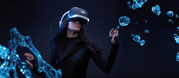 beautiful woman with flowing hair over dark magic background. girl in glasses of virtual reality while touching air in blue neon lights. augmented reality, game, future technology concept. vr.