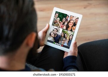 group of friends in video call with smartphone and tablet from a distance - girlfriends with red wine, couple traveling, kids in the city, family with small child in the garden - view of the device