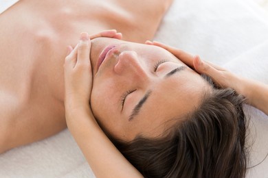 men are given facial massages.