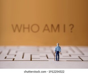 memory loss from dementia or alzheimer disease concept. brain function decline. miniature of a senior elderly man standing in front of the maze and the question of who am i