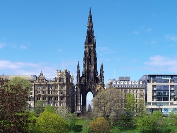 princes street, edinburgh, scotland. a view which includes the scott monument and jenners department store